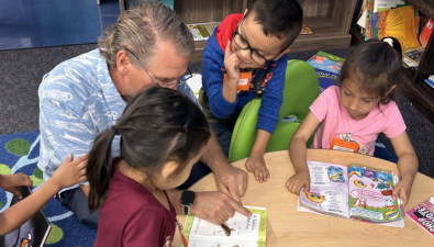  Dr. Bob reading to Kinder students